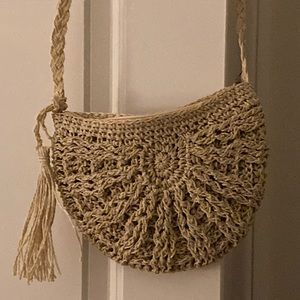 Tassel woven straw crossbody bag
